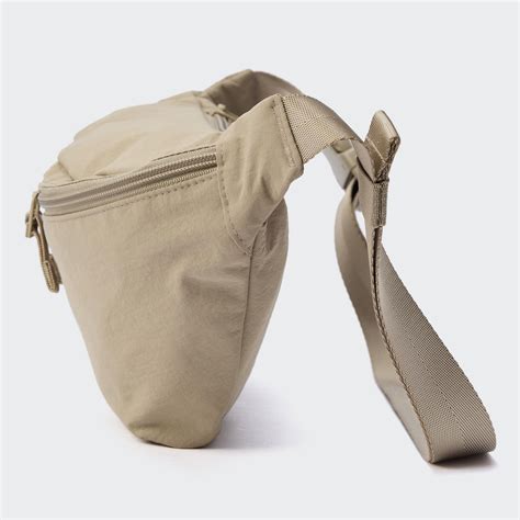 uniqlo nylon body bag.